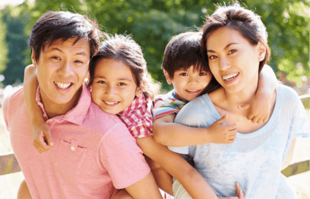 family posing for photo