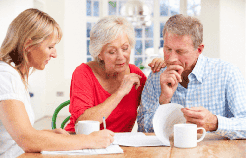 mature couple meeting with attorney